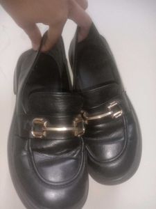 Black Loafers with Gold Detail