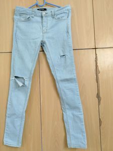 Low Waist Light Blue Ripped Jeans