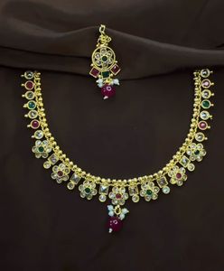Golden Jewellery Set With Tikka