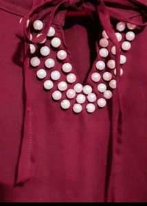 Beautiful Top With Pearl Neck And Stylish Sleeves