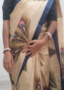 Elegant Beige Peacock Feather Saree