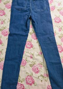Ripped Knee Jeans