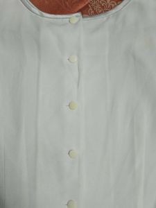 White Sleeveless Top
