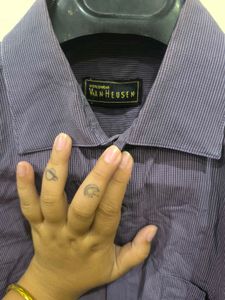 Purple Shirt With White Straps From Van Heusen.