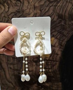 Bow N Pearls Long Korean Earrings