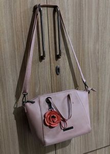 Caprese Peach-Coloured Solid Handheld Bag