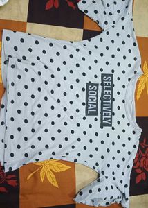 A Grey Top With Polka Dots