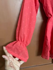 Coral Peplum Top