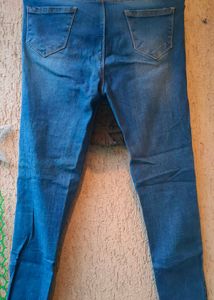 Ripped High-Waisted Skinny Jeans