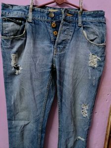 Ripped Blue Denim Jeans