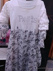 a fancy floral white dress