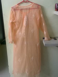 Peachy Orange Transparent Chikankari Kurti With inner