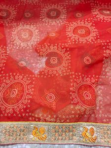 very pretty bandhani orange saree