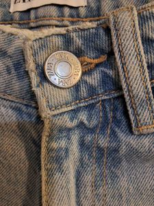Distressed Denim Jeans