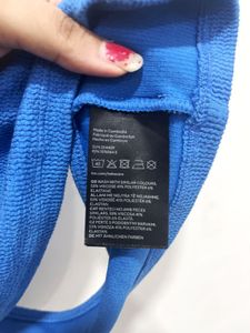 H&amp;M Blue Knotted Cut Out Crop Top