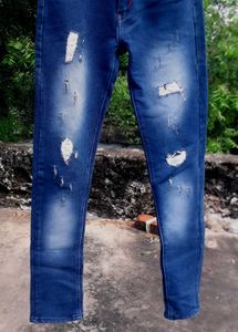 Ripped Blue Denim Jeans