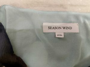 Stylish Top with Tie Detail.