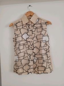 Geometric Sleeveless Button-Up