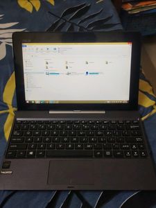 Asus mini windows touch laptop bacome Tab