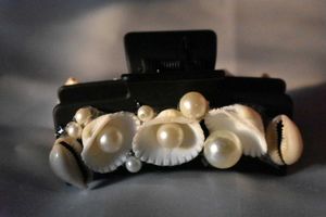 Trendy Seashell Clutcher With Touch Of Butterfly