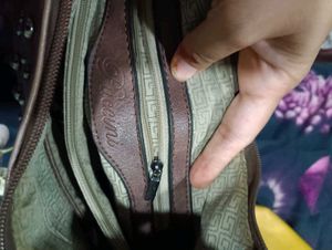 Brown Leather Shoulder Bag with Studded Design |