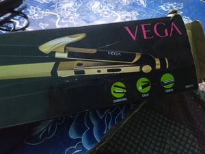 With the Vega 3-in-1 Hair Straightener, look glamorous in straight, curly, or crimped hair  hairstyling appliance features Ceramic-coated Plates, Crimper Plates, and a 360