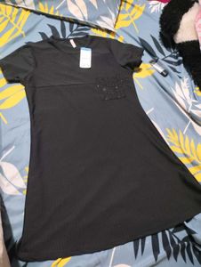 Black Ribbed Tee with Pocket Detail