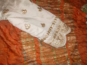 Orange Saree With Beautiful Tassel