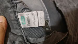 Two Pant One Is Branded