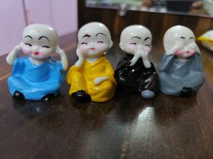 Pack Of 4 Monk Showpiece