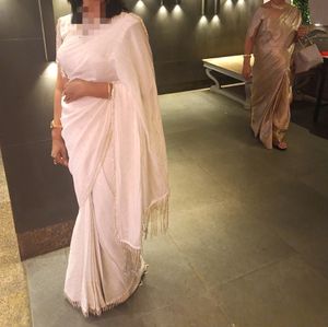 Trendy Beads Work Sari With Sleevless Blouse