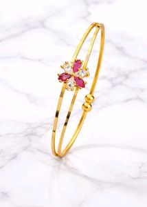 Floral Design Gold Bangles