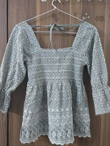 Embroidered Peplum Top