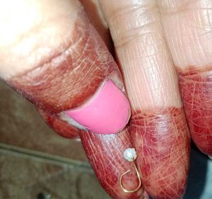 Pearl nose pin yellow gold