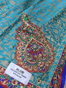 Teal And Red Embellished Saree