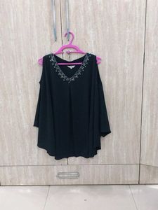 A Black Party Cape Top.