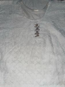 Elegant White Embroidered Kurti