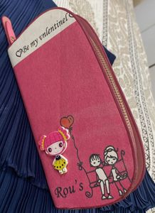 Chic Pink Clutch Wallet with Cute Illustrations