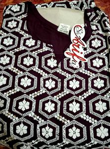 purple and white colour embroidery kurthi