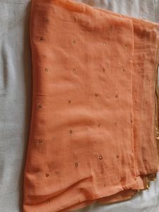 Light Orange Soft Chiffon Saree.