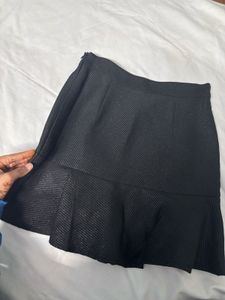 Black Mini Skirt with Ruffle Detail