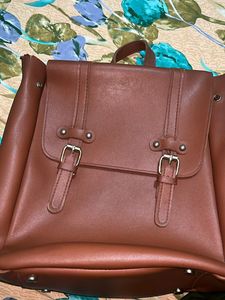 Backpack- Raxine Material- Stitched Good Condn