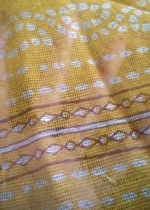yellow printed saree attached fall