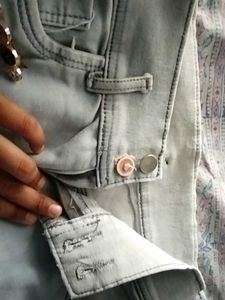 Distressed Jeans with Button Detail