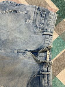 Distressed Denim Mini Skirt