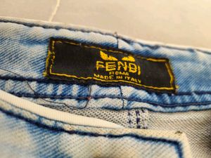 Distressed Light Wash Denim Jeans