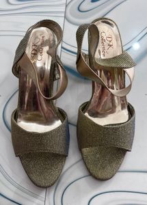 Gold Heels never used new