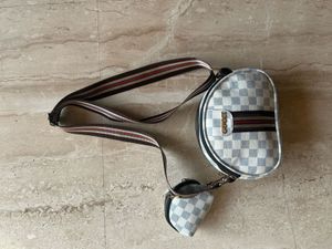 Gucci white sling bag