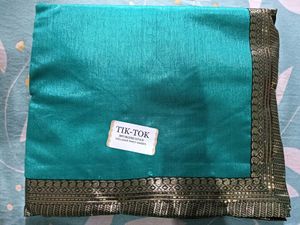 Teal Silk Saree with Gold Border