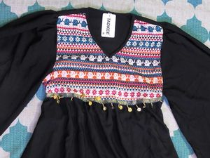 TADKEE Women&#39;s Geometric Pattern V-Neck Bell Sleev